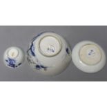 A Chinese Nanking cargo blue and white bowl and a tea bowl and saucer (Christie's label on base)