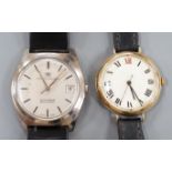 A gentleman's 1930' 9ct gold manual wind wrist watch, on a leather strap, 27.5 grams and a similar