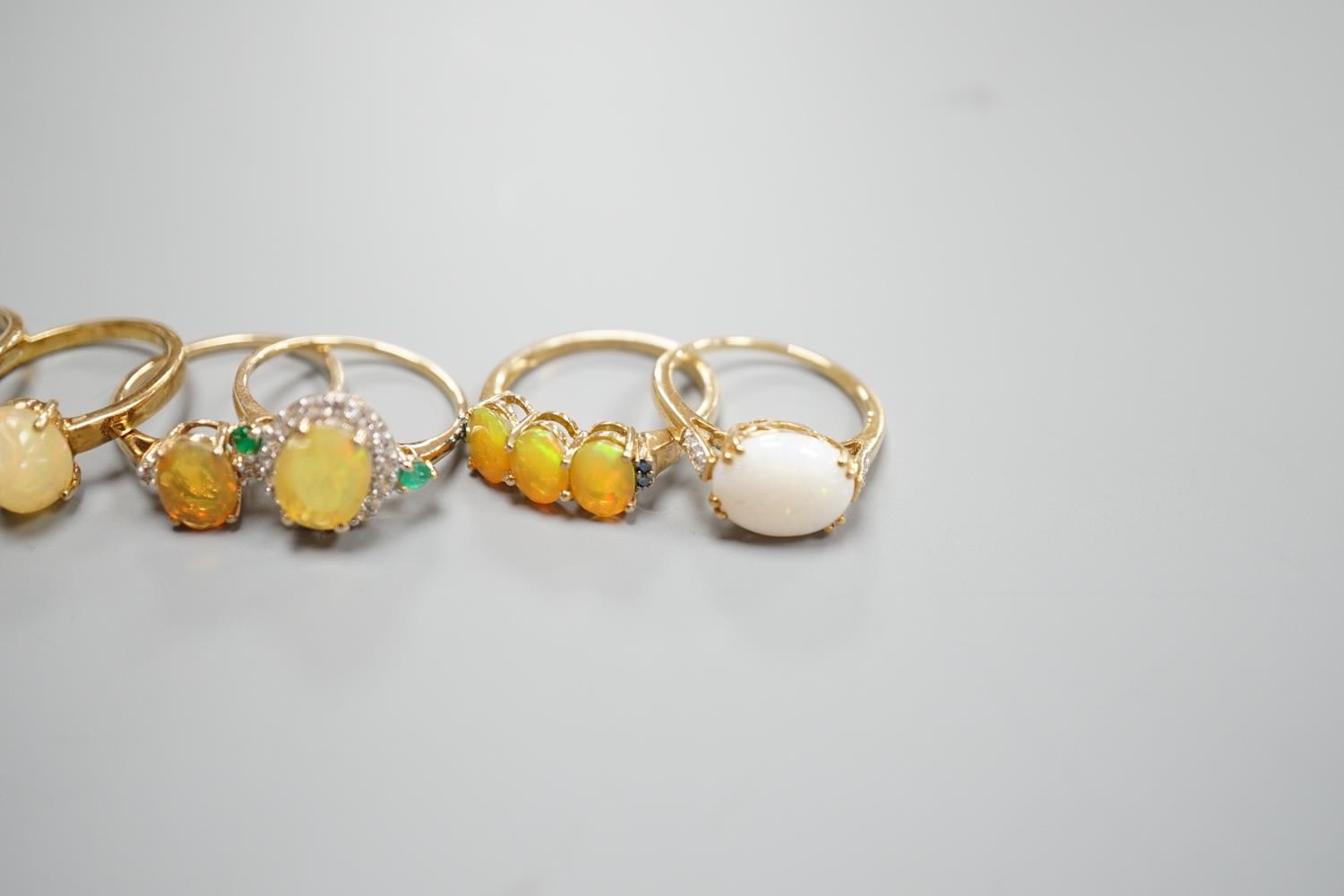 Seven assorted modern opal and gem set dress rings, gross 14.6 grams and a 925 ring. - Image 4 of 5