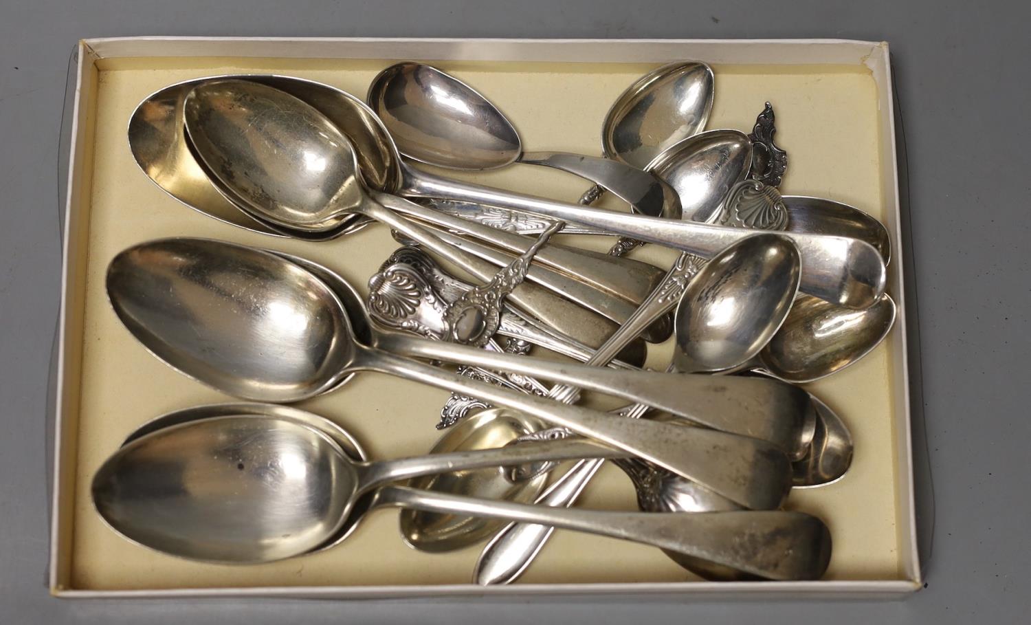 A George III provincial silver caddy spoon, Goss & Parsons, Exeter, 1810 and seventeen assorted