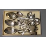 A George III provincial silver caddy spoon, Goss & Parsons, Exeter, 1810 and seventeen assorted