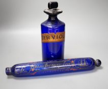 A Victorian cobalt blue glass apothecary jar and a rolling pin (2)