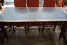 An early 20th century rectangular mahogany three drawer library table, width 190cm depth 79cm height