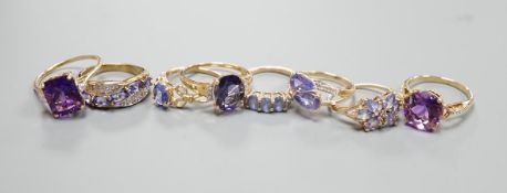 Six assorted modern 9ct gold gem set rings, including amethyst, gross 13.9 grams, a similar 14ct