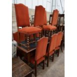 A set of ten Carolean design upholstered oak dining chairs