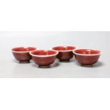 A set of four Chinese ox blood bowls, marks to base, 3.5cm high