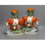 A pair of large Mid 19th century Staffordshire ‘cow and calf’ spill vases, 29cm