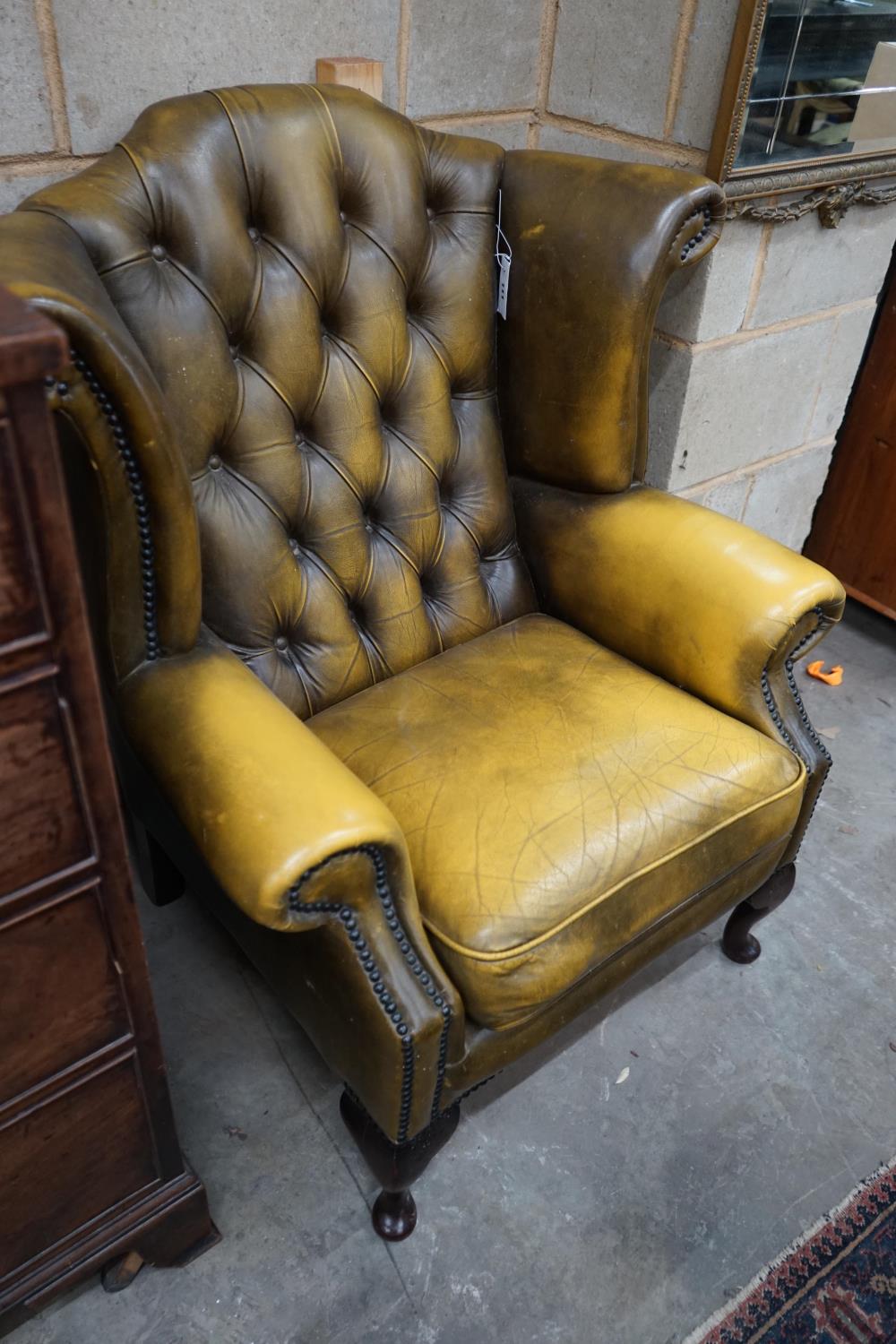 A Victorian style green leather wing armchair, width 82cm depth 76cm height 100cm - Image 2 of 3