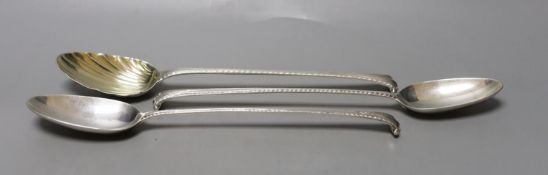 Three George III silver Onslow pattern basting spoons, two with pinched marks, one dated London,