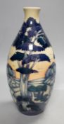 A Moorcroft 'trees in a landscape' trial vase, boxed,23cms high.