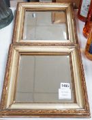 A pair of squared bevelled wall mirrors (2) 29cm sq including frames