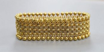 A yellow metal Etruscan style bracelet, 16cm, 38 grams.