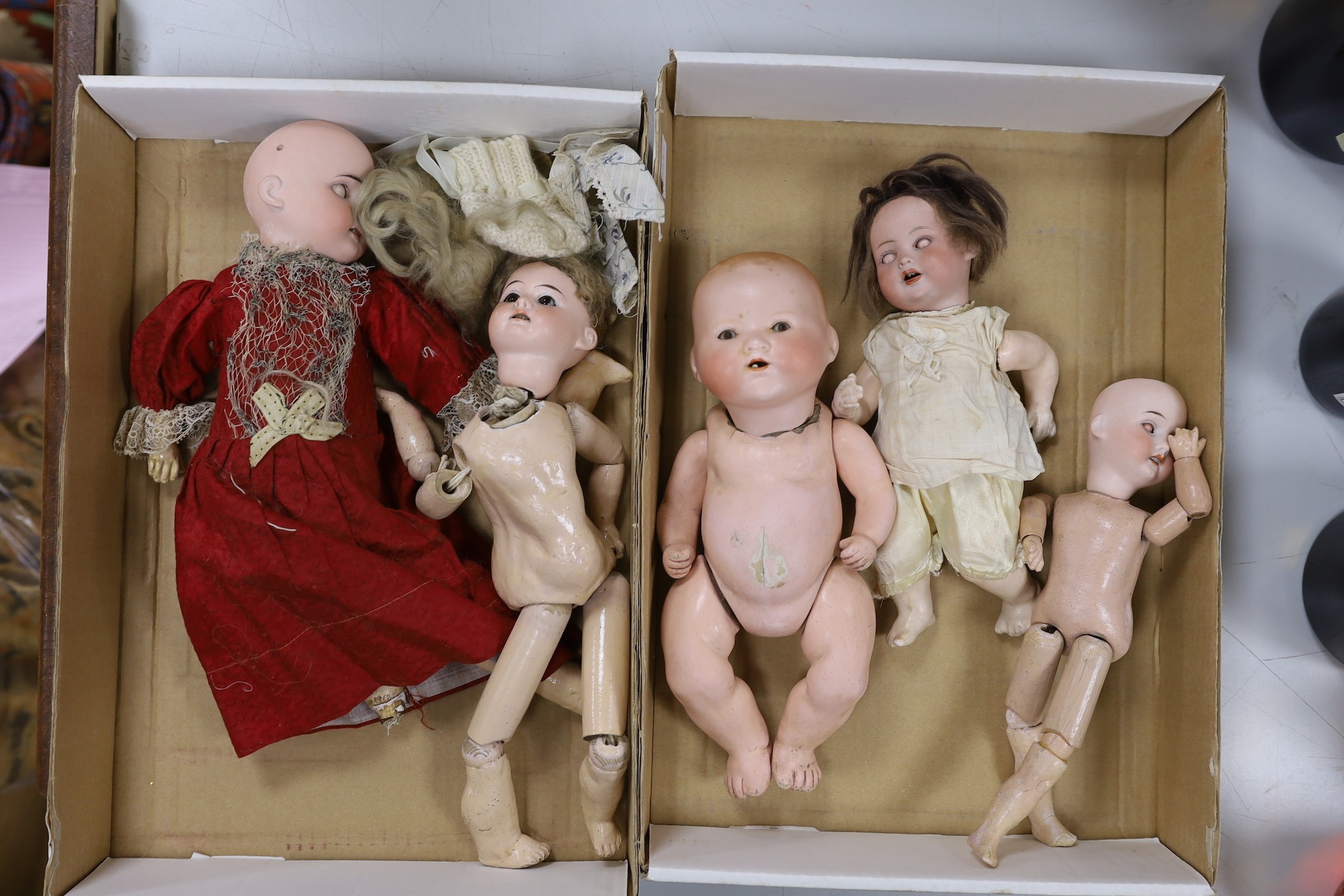 A collection of five 19th century, mostly Armand Marseille, dolls, all open mouthed