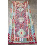 An Anatolian style Afghan polychrome flatweave runner, 200 x 86cm