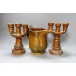 A 19th century rustic pottery jug and a pair of candelabra, 23cm