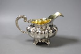 A William IV silver cream jug, Edward Barton, London, 1833, 8oz.