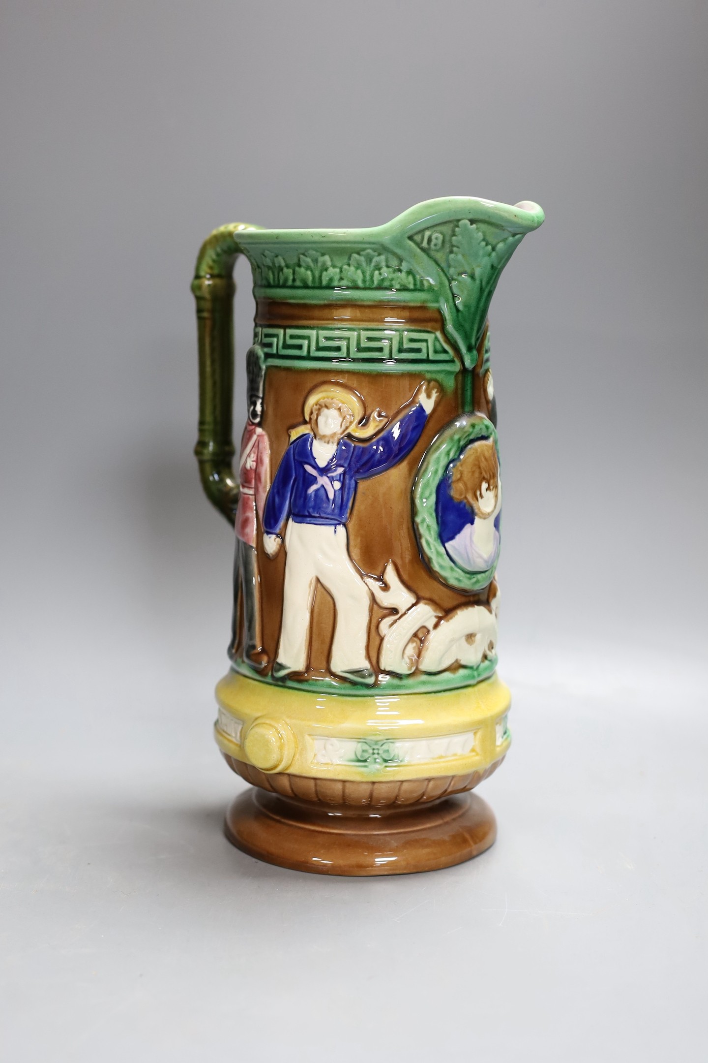 A Victorian Majolica military volunteers commemorative jug - 27cm tall