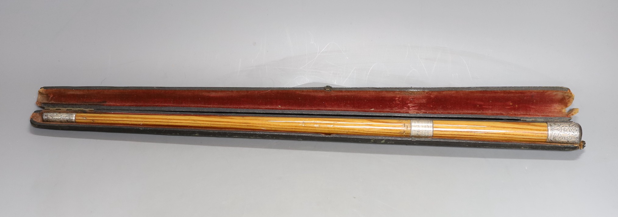 A cased presentation conductors baton,baton 51.5 cms long.