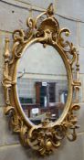 A Victorian giltwood and gesso girandole, width 65cm, height 100cm