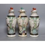 Three Chinese crackleware jars and covers, 26cm
