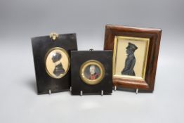 An unusual portrait miniature of a 19th century gentleman wearing earrings, together with two framed