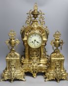 A large decorative French gilded bronze 19th century clock garniture - 56cm tall