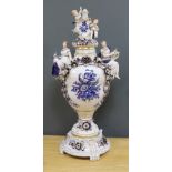 A large and impressive gilt blue and white Dresden lidded urn on stand - 77cm high