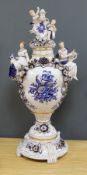 A large and impressive gilt blue and white Dresden lidded urn on stand - 77cm high