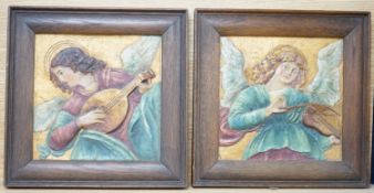 Continental School c.1900, a pair of embossed and painted canvas panels, Angels playing instruments,