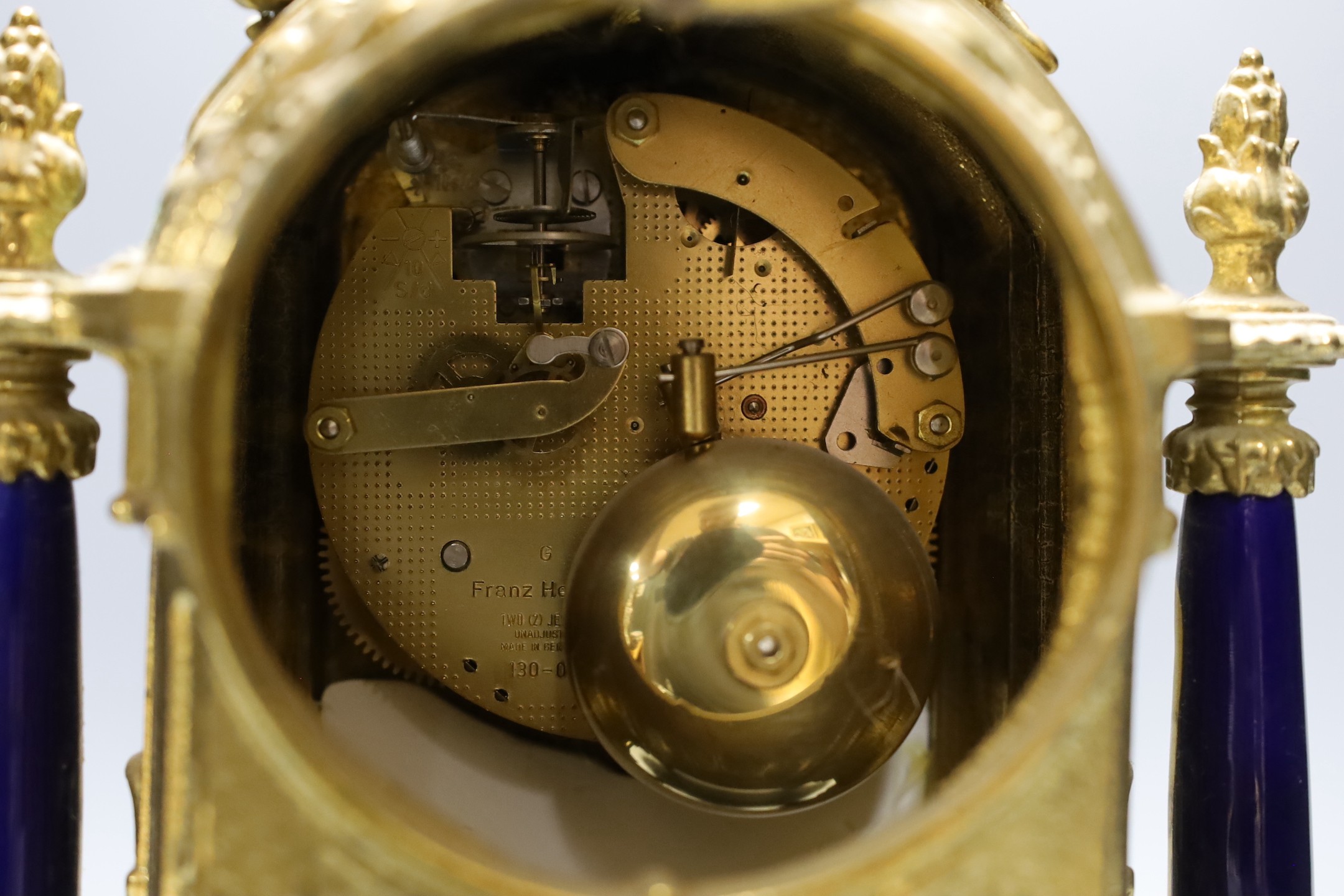 A ornamental gilt French mantel clock with painted porcelain insets - 41.5cm tall - Image 3 of 3