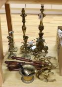 A group of mixed antique brass wares to include candlesticks, a mortar and pestle, etc