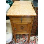 A pair of early 20th century marble topped carved oak bedside cabinets, width 42cm, depth 38cm,