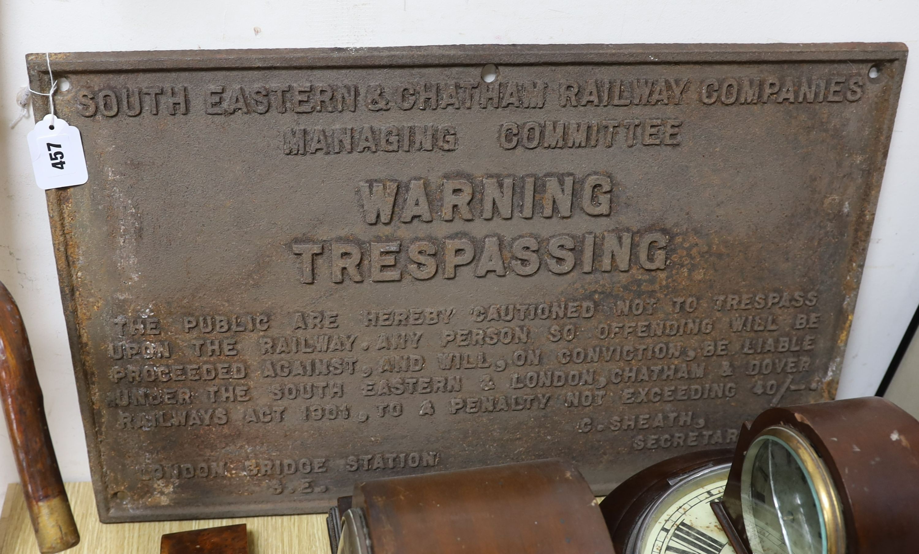 A cast iron South Eastern and Chatham Railway trespassing sign 1899-1923, 41x66cm