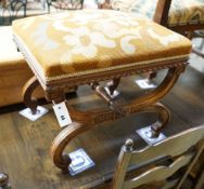 An early 20th century French walnut X frame stool, width 52cm, depth 42cm, height 45cm