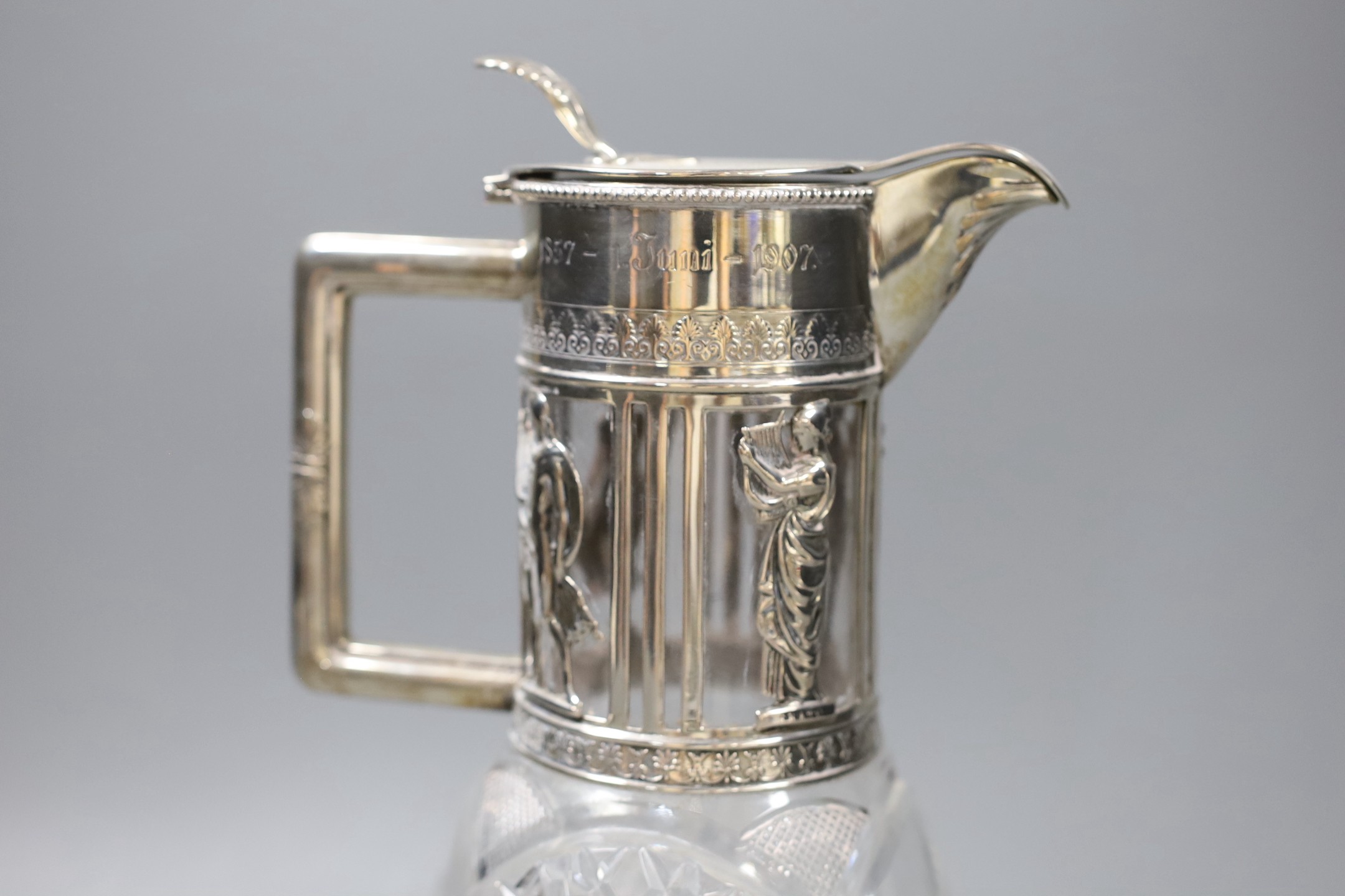 A late 19th/early 20th century German 800 standard white metal mounted cult glass claret jug, - Image 2 of 4