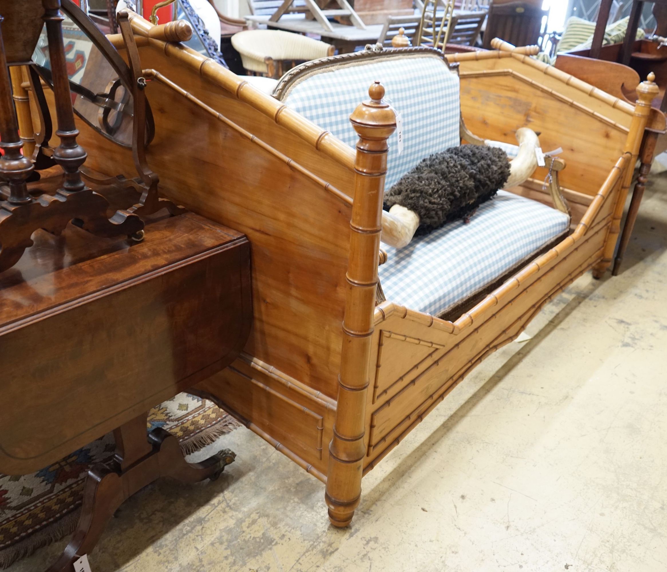 A 19th century French cherry faux bamboo bedframe, width 200cm depth 128cm height 117cm