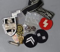 WWII German Third Reich badges, pins and ephemera including an SS badge