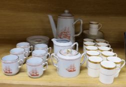 A Copeland fifteen piece coffee service, Trade Winds pattern, and a Doulton Royal Gold pattern