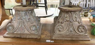 A near pair of carved and painted wood Corinthian column capitals, width 41cm, depth 41cm, height