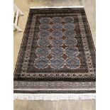A Karachi blue-brown rug, 180 x 125cm