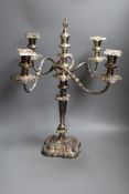 A decorative four branch plated candelabrum - 53cm tall