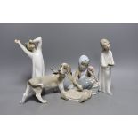 Four Lladro porcelain figures, tallest 22 cm