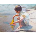 Tony Sheath (b.1946), oil on board, Boy with a toy sailing boat, signed, 20 x 25cm