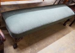 A George II style upholstered window seat on carved cabriole legs, length 168cm, depth 46cm,