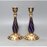 A pair of Davenport Imari style candlesticks - 18.5cm tall