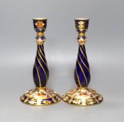 A pair of Davenport Imari style candlesticks - 18.5cm tall