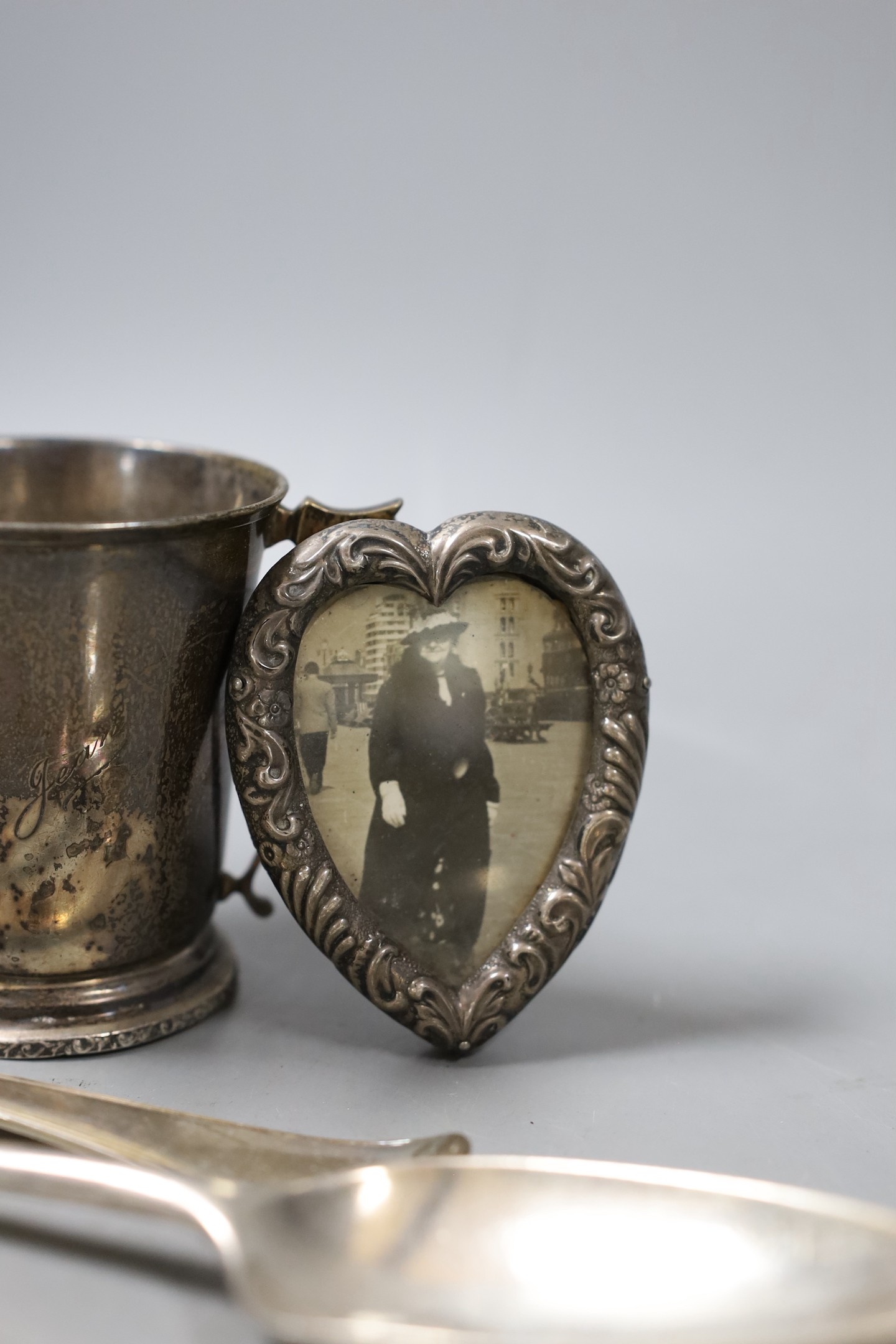 Two 18th century silver spoons, a later silver christening mug, small silver mounted heart shaped - Image 2 of 4