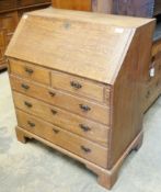 A George III pale oak bureau, width 91cm, depth 54cm, height 105cm