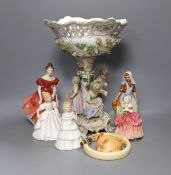 Five Royal Doulton figurines, a Hummel hanging and a Sitzendorf style table centre, 33cm tall