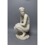 Fritz Klimsch for Rosenthal, a bisque porcelain figure of a crouching nude female, signed 42cm